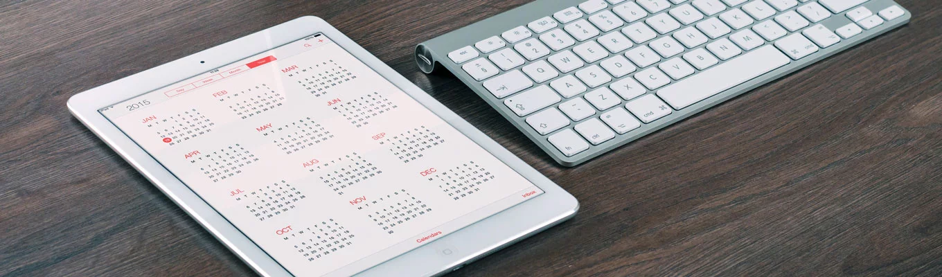 Crisp shot of an iPad with Calendar App loaded and keyboard.